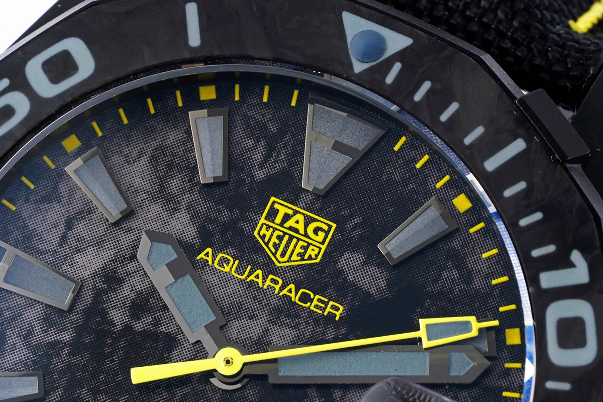 Aquaracer Calibre 5 Carbon Dial with Yellow Tachymeter