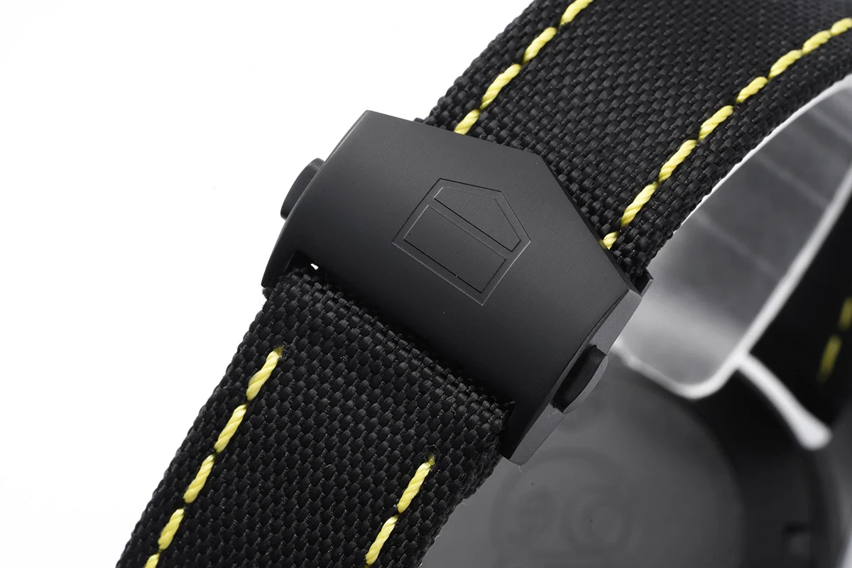 Aquaracer Calibre 5 Carbon Dial with Yellow Tachymeter