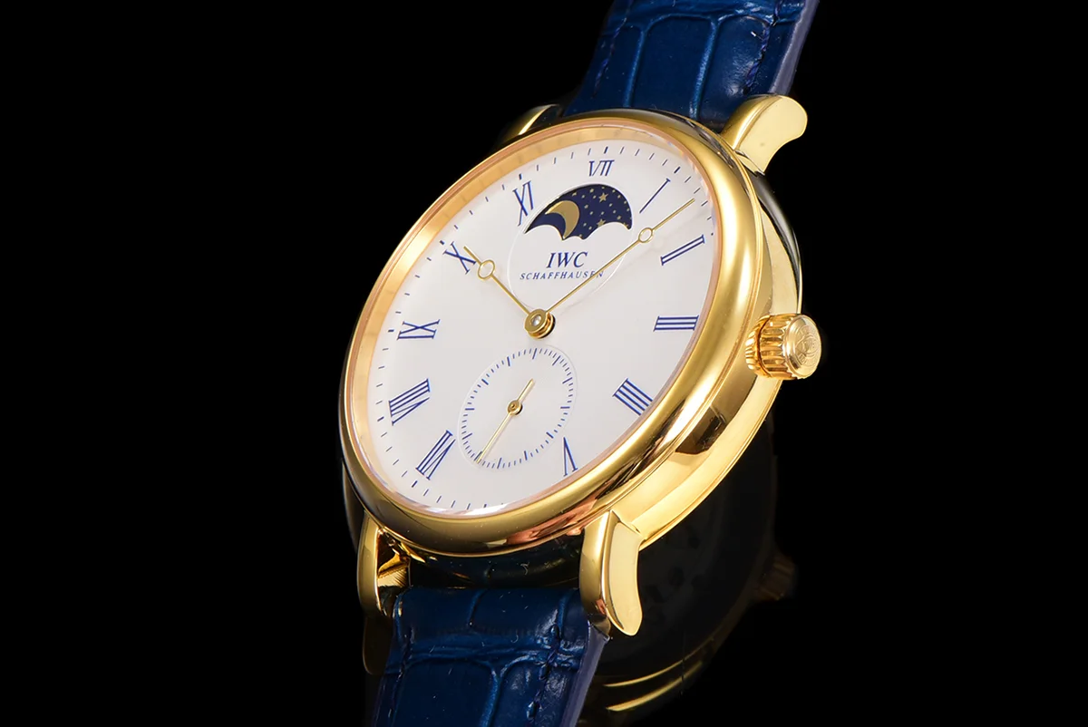 Portofino Hand Wound Moon Phrase IW5548 White Dial in Yellow Gold